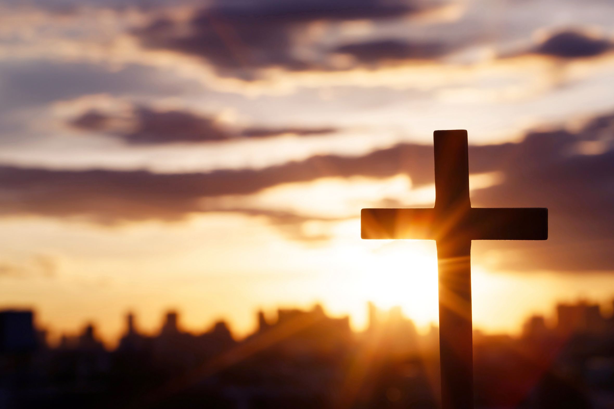 Silhouette of a Cross at Sunset